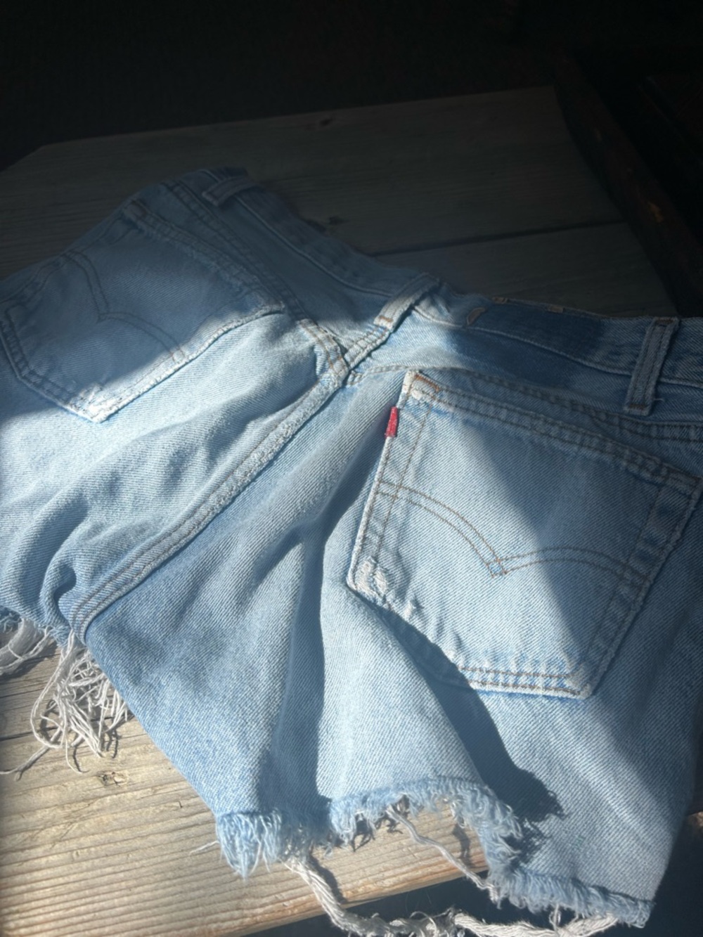 Women’s vintage Levi’s Light Wash Denim Cutoff Shorts with Raw Hem
